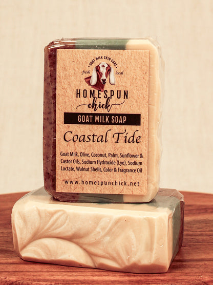 Bar of goat milk soap with 'Homespun Chick' branding on a wooden surface.